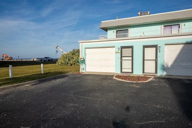 garage with a yard