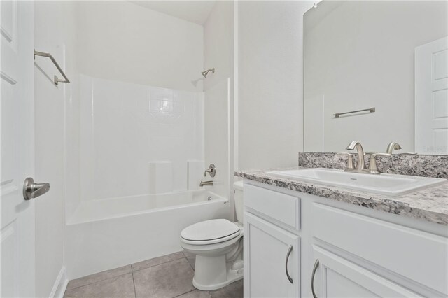 full bathroom with vanity, tile patterned floors, toilet, and bathtub / shower combination