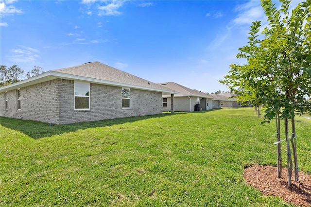 exterior space with a yard