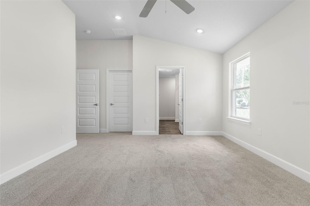 7 Whitcock Ln, Palm Coast, FL 32164 - unfurnished bedroom with baseboards, carpet floors, vaulted ceiling, recessed lighting, and a ceiling fan