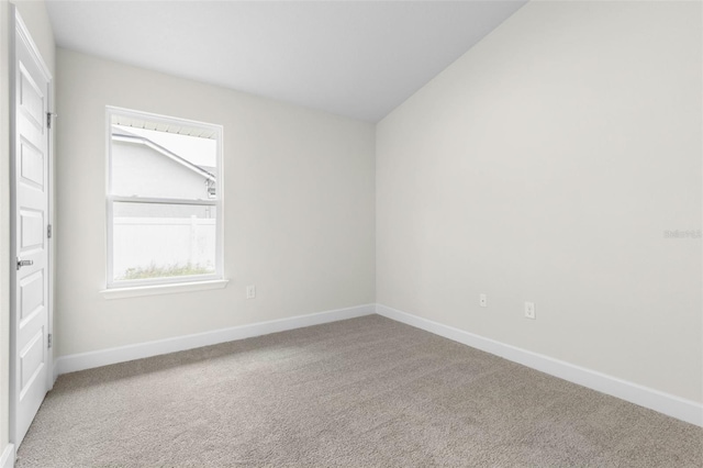 7 Whitcock Ln, Palm Coast, FL 32164 - unfurnished room with carpet floors and baseboards