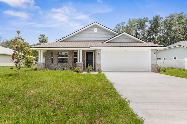 7 Whitcock Ln, Palm Coast, FL 32164 - craftsman-style home featuring a garage, driveway, and roof with shingles