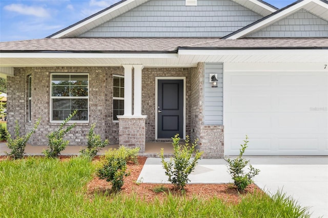 7 Whitcock Ln, Palm Coast, FL 32164 - view of exterior entry featuring a garage, covered porch, a shingled roof, brick siding, and driveway