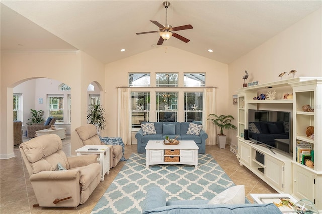 living room with ceiling fan, light tile patterned floors, and high vaulted ceiling