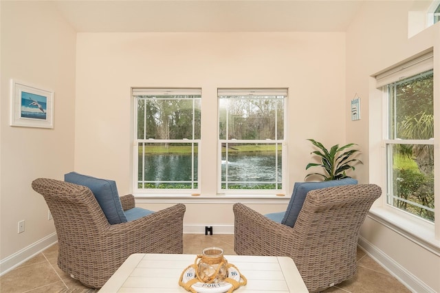 living area featuring light tile patterned floors