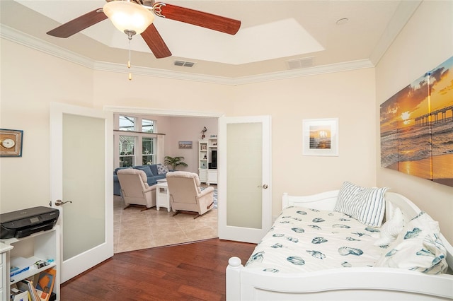 bedroom with french doors, ceiling fan, ornamental molding, and dark hardwood / wood-style flooring