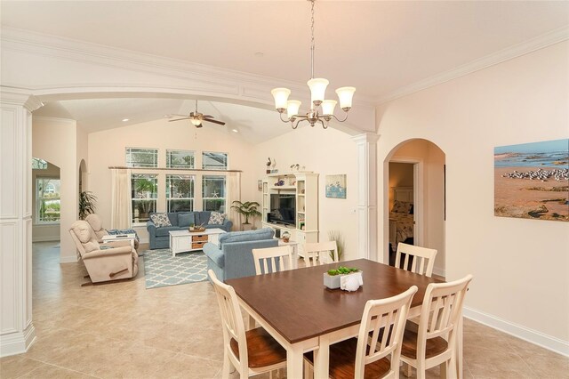 dining area featuring ornate columns, ceiling fan with notable chandelier, lofted ceiling, ornamental molding, and light tile patterned floors