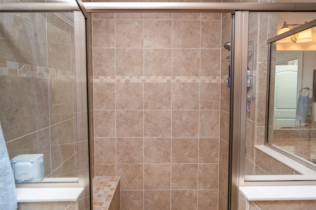 bathroom with an enclosed shower