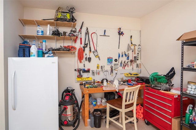 interior space featuring a workshop area