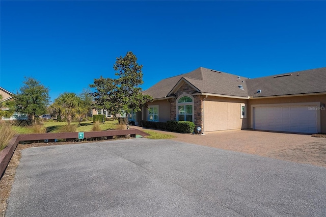 view of front of home featuring a garage