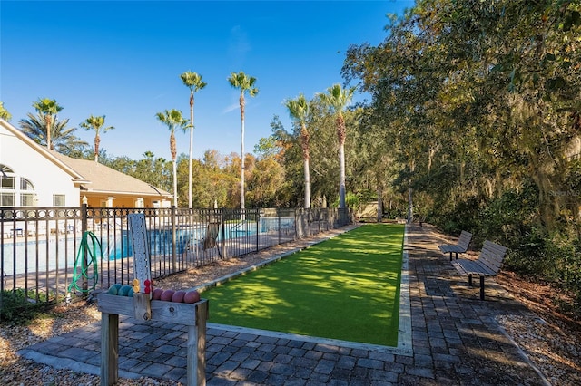 view of property's community featuring a swimming pool