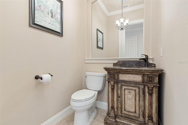 half bath featuring crown molding, visible vents, toilet, vanity, and baseboards