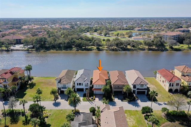 aerial view featuring a water view and a residential view