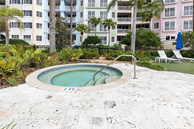 view of pool featuring a community hot tub