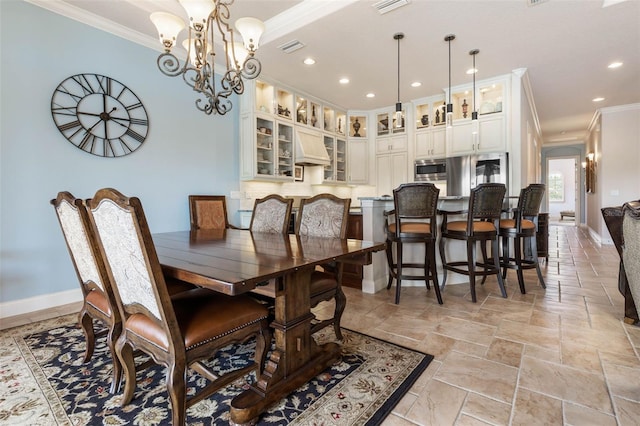 dining area featuring stone tile floors, visible vents, baseboards, ornamental molding, and recessed lighting