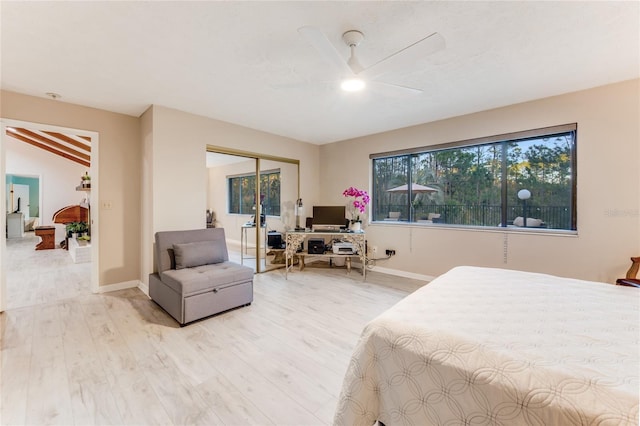 bedroom with light hardwood / wood-style flooring, a closet, and ceiling fan