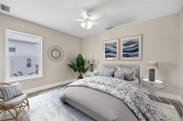 carpeted bedroom featuring ceiling fan