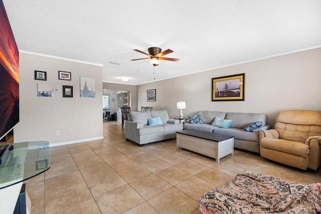 tiled living room featuring crown molding and ceiling fan