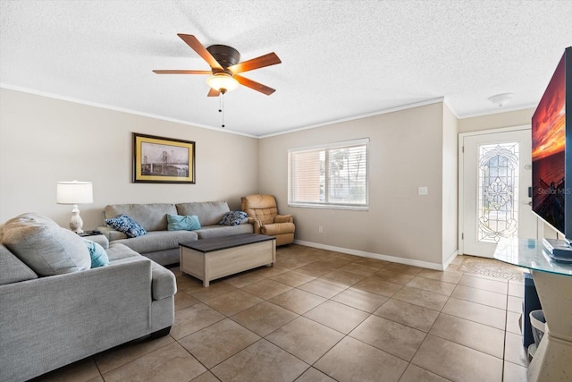 tiled living room with crown molding, a textured ceiling, and ceiling fan