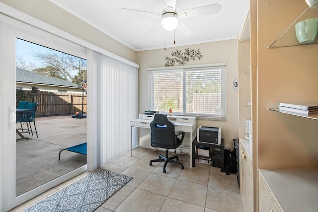 office featuring light tile patterned floors, ornamental molding, and ceiling fan