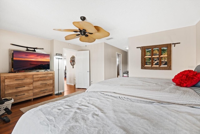 bedroom featuring hardwood / wood-style flooring and ceiling fan