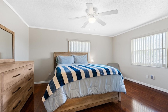 bedroom with crown molding, ceiling fan, dark hardwood / wood-style flooring, and a textured ceiling