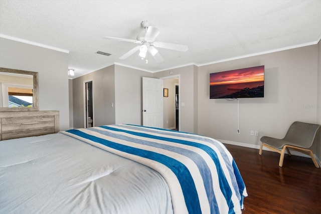 bedroom featuring ornamental molding, dark hardwood / wood-style floors, ceiling fan, and a textured ceiling