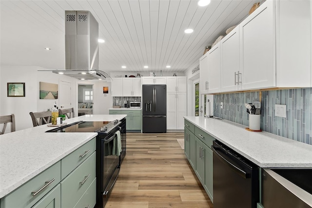 kitchen with white cabinetry, wood ceiling, island exhaust hood, light stone countertops, and black appliances