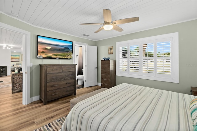 bedroom featuring crown molding, ceiling fan, light hardwood / wood-style flooring, and wooden ceiling