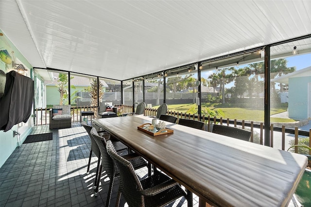 unfurnished sunroom with a healthy amount of sunlight