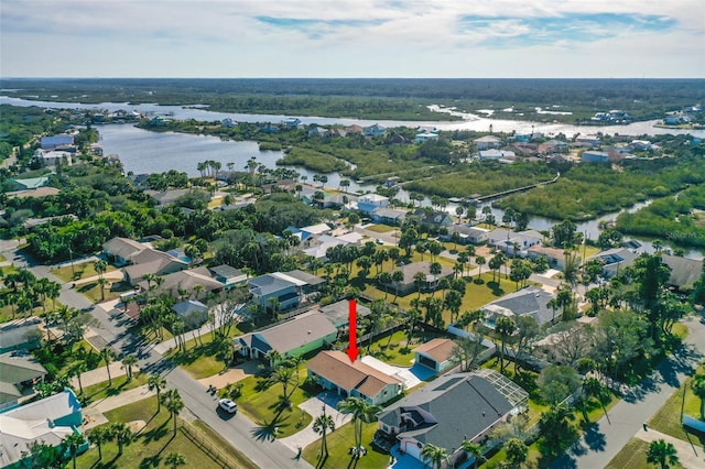 aerial view with a water view and a residential view