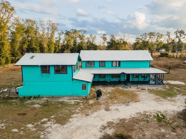 view of front of property featuring metal roof