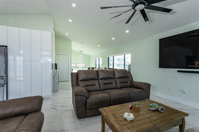 living room featuring lofted ceiling and ceiling fan