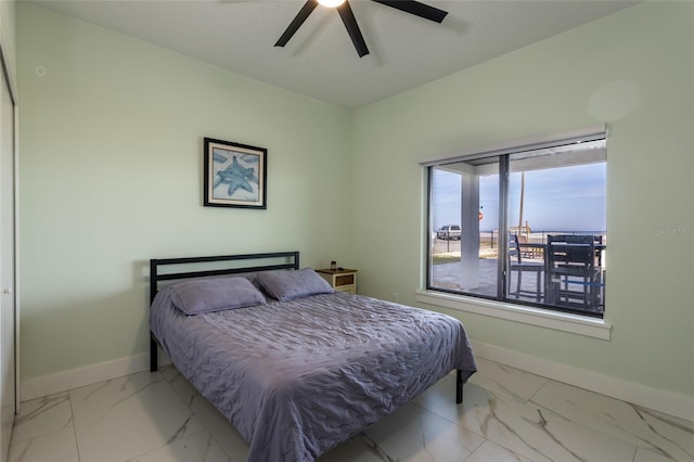 bedroom featuring ceiling fan