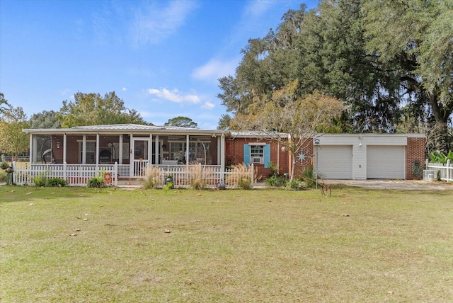 ranch-style house with a garage and a front yard