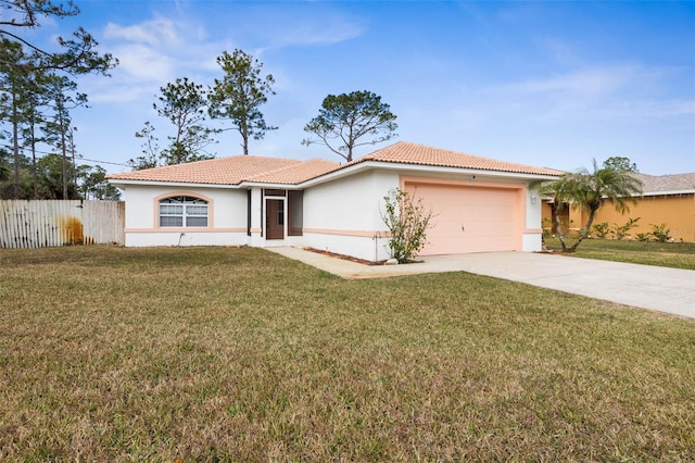 view of front of home featuring a garage and a front lawn