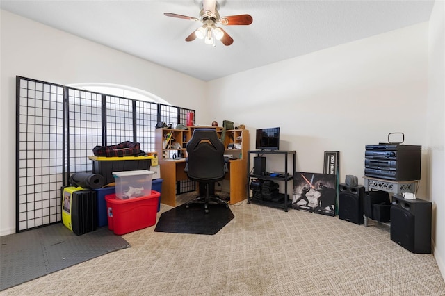 office area featuring ceiling fan and light carpet