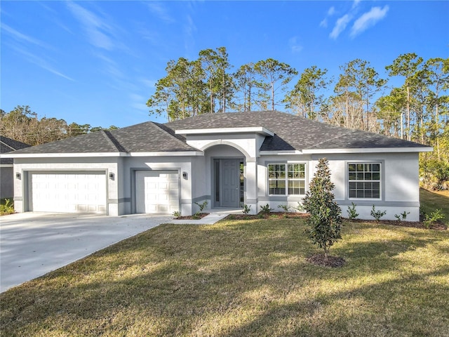 ranch-style house with a garage and a front yard