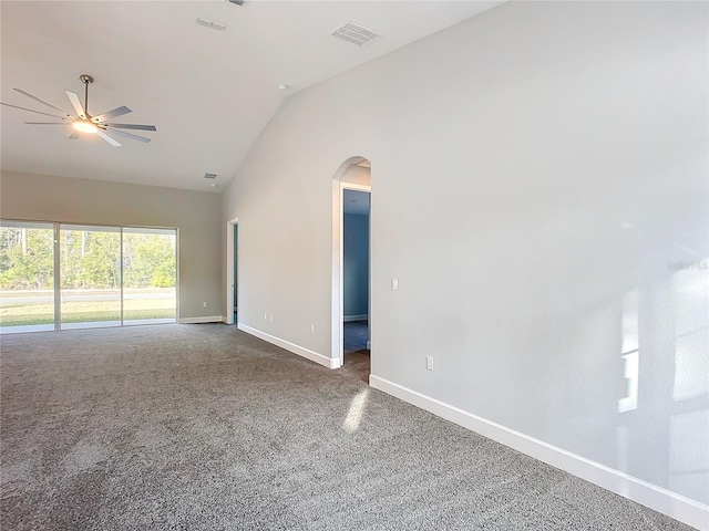 carpeted spare room featuring high vaulted ceiling and ceiling fan