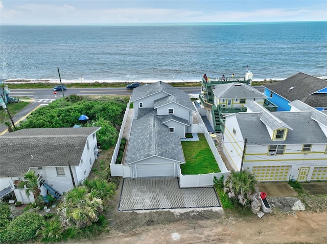 bird's eye view featuring a water view and a residential view