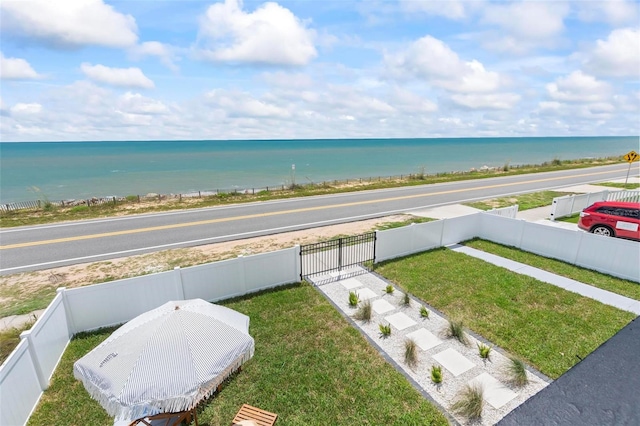 water view with a fenced backyard