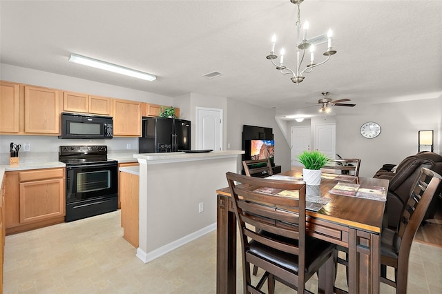 kitchen featuring a kitchen island, light brown cabinetry, ceiling fan, black appliances, and a textured ceiling