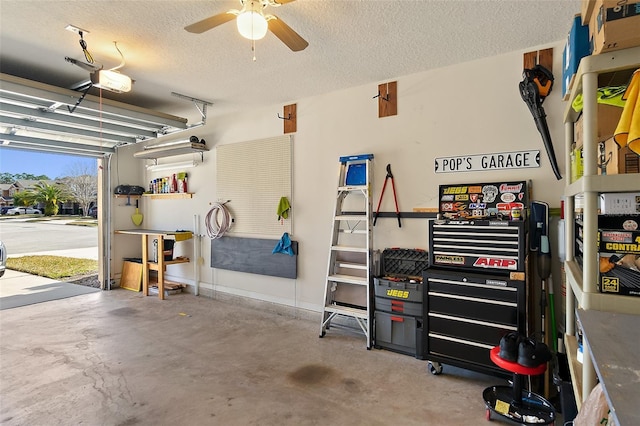 garage with ceiling fan and a garage door opener