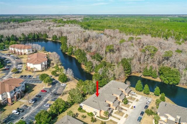 drone / aerial view featuring a water view