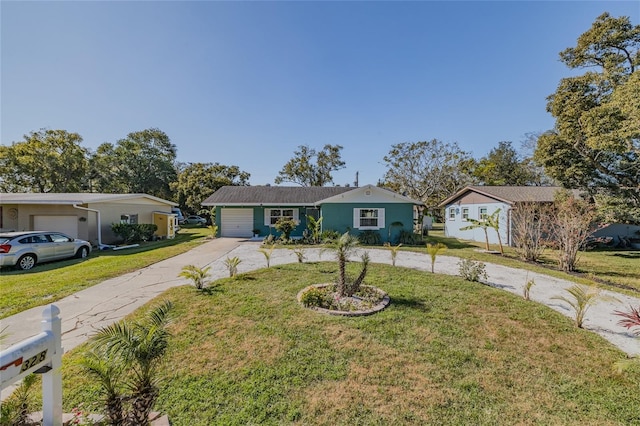 ranch-style house with a garage and a front yard