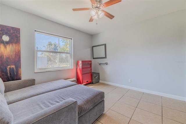 bedroom featuring ceiling fan and light tile patterned floors