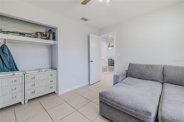 interior space featuring ceiling fan