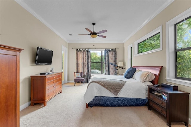 bedroom with light carpet, crown molding, and multiple windows