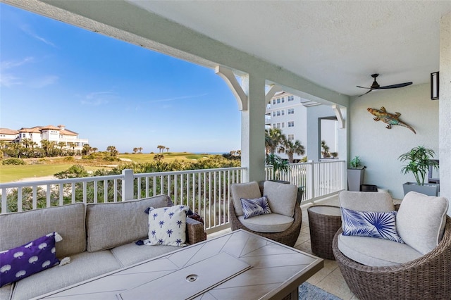 balcony with ceiling fan and outdoor lounge area