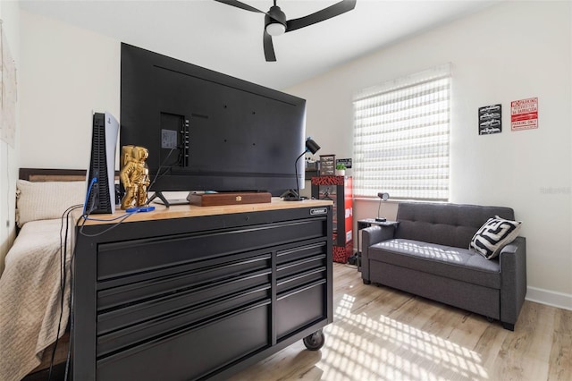 bedroom featuring ceiling fan and light wood-type flooring